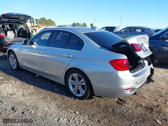 2018 BMW 3 Series 330i with VIN WBA8B9G58JNU97318, listed as a IAAI auction lot 41205434 with 62,582 mi miles. Bid and sale history available at carsss.com. Image 3.