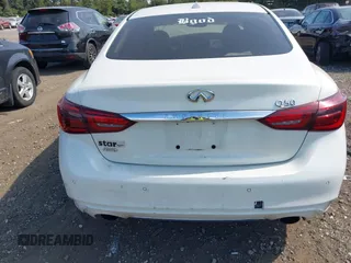 2019 Infiniti Q50 Luxe with VIN JN1EV7ARXKM557946, listed as a IAAI auction lot 40362058 with 56,615 mi miles and . Bid and sale history available at carsss.com. Image 16.