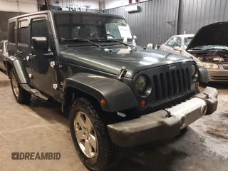 2008 Jeep Wrangler Unlimited Sahara with VIN 1J8GA59168L549855, listed as a IAAI auction lot 41516629 with 136,594 mi miles and . Bid and sale history available at carsss.com. Image 1.