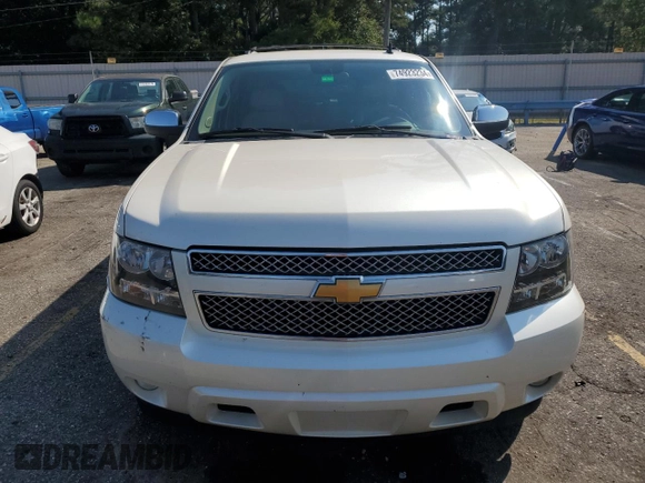 2013 Chevrolet Suburban LTZ with VIN 1GNSCKE03DR104530, listed as a Copart auction lot 74923234 with 230,803 mi miles and Clean Title. Bid and sale history available at carsss.com. Image 5.