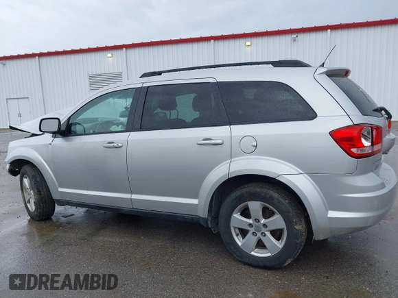 2013 Dodge Journey Canada Value z VIN 3C4PDCABXDT563439, wystawiony jako IAAI lot #42227899 z przebiegiem 213 199 mil mil oraz . Historia ofert i sprzedaży dostępna na DreamBid. Obrazek 13.