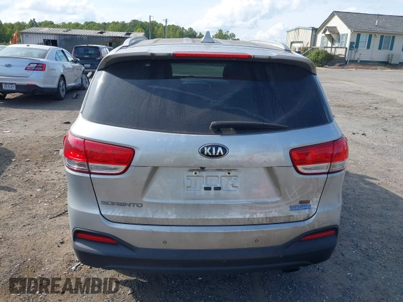 2018 Kia Sorento LX with VIN 5XYPGDA3XJG427112, listed as a IAAI auction lot 40303681 with 170,443 mi miles. Bid and sale history available at carsss.com. Image 16.