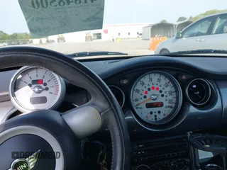 2006 MINI Hardtop with VIN WMWRC33596TK73174, listed as a IAAI auction lot 41848500 with 182,704 mi miles and . Bid and sale history available at DreamBid. Image 7.