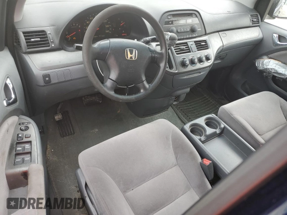 2007 Honda Odyssey LX with VIN 5FNRL382X7B054326, listed as a Copart auction lot 58912205 with 168,994 mi miles and Clean title. Bid and sale history available at DreamBid. Image 8.