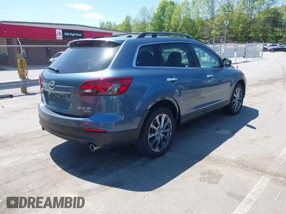 2015 Mazda CX-9 Grand Touring with VIN JM3TB3DV4F0448210, listed as a IAAI auction lot 42061711 with 149,289 mi miles. Bid and sale history available at carsss.com. Image 4.
