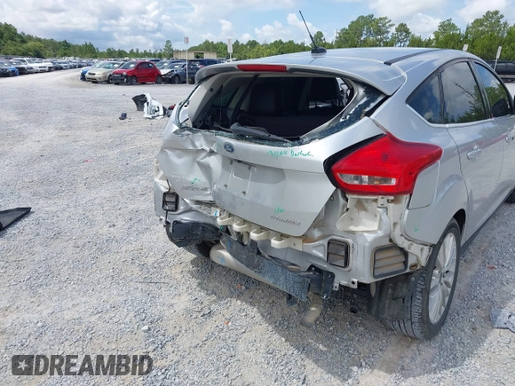 2018 Ford Focus Titanium with VIN 1FADP3N29JL232336, listed as a IAAI auction lot 42485243 with 82,113 mi miles and . Bid and sale history available at DreamBid. Image 6.