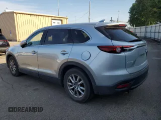 2018 Mazda CX-9 Touring z VIN JM3TCACY4J0219449, wystawiony jako Copart lot #61949725 z przebiegiem 134 904 mil mil oraz Czysty tytuł • Clean title. Historia ofert i sprzedaży dostępna na DreamBid. Obrazek 2.