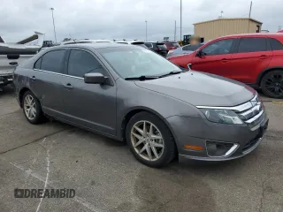 2012 Ford Fusion SEL z VIN 3FAHP0JA2CR232860, wystawiony jako Copart lot #57754735 z przebiegiem 234 638 mil mil oraz Szkody całkowita. Historia ofert i sprzedaży dostępna na DreamBid. Obrazek 4.