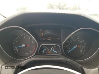 2016 Ford Focus SE z VIN 1FADP3F21GL386580, wystawiony jako Copart lot #63326425 z przebiegiem 82 139 mil mil oraz Szkoda całkowita • Salvage title. Historia ofert i sprzedaży dostępna na DreamBid. Obrazek 9.