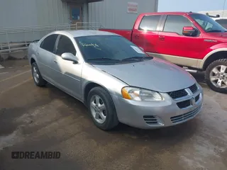 2006 Dodge Stratus SXT z VIN 1B3EL46X46N246054, wystawiony jako IAAI lot #42008072 z przebiegiem 177 063 mil mil oraz . Historia ofert i sprzedaży dostępna na DreamBid. Obrazek 1.