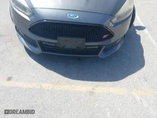 2015 Ford Focus ST with VIN 1FADP3L94FL241243, listed as a IAAI auction lot 41964511 with 97,259 mi miles. Bid and sale history available at carsss.com. Image 12.