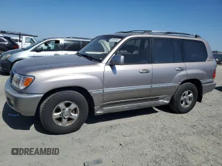2001 Toyota Land Cruiser z VIN JTEHT05J812012460, wystawiony jako Copart lot #59053845 z przebiegiem 287 639 mil mil oraz Szkoda całkowita • Salvage title. Historia ofert i sprzedaży dostępna na DreamBid. Obrazek 1.