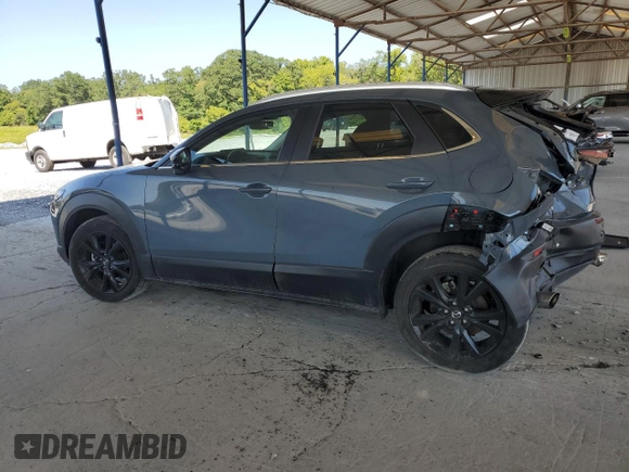 2022 Mazda CX-30 2.5 Turbo with VIN 3MVDMBAY5NM412116, listed as a Copart auction lot 68375524 with 25,799 mi miles and Salvage Title. Bid and sale history available at DreamBid. Image 2.