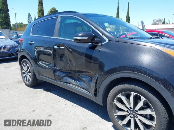 2019 Kia Sportage EX with VIN KNDPN3AC2K7602435, listed as a IAAI auction lot 42233427 with 58,730 mi miles and . Bid and sale history available at DreamBid. Image 6.