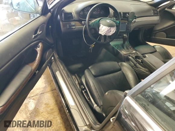 2002 BMW 3 Series 325Ci with VIN WBABS334X2PG87677, listed as a Copart auction lot 48860095 with Not Provided miles and Salvage Title. Bid and sale history available at DreamBid. Image 8.