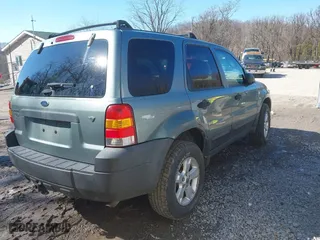 2006 Ford Escape XLT with VIN 1FMYU93166KA88481, listed as a IAAI auction lot 41717872 with 155,539 mi miles. Bid and sale history available at carsss.com. Image 4.