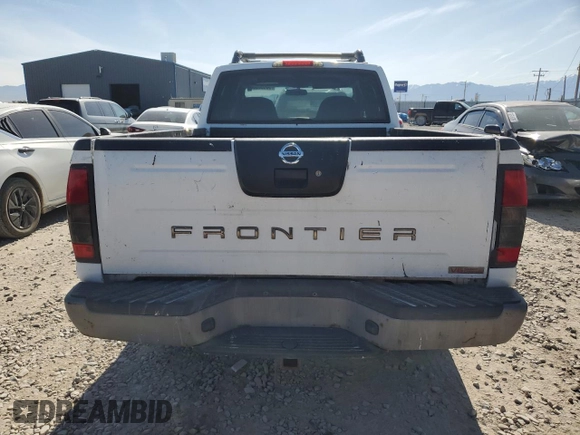 2002 Nissan Frontier SC z VIN 1N6MD29Y52C369414, wystawiony jako Copart lot #58532505 z przebiegiem 249 926 mil mil oraz Szkoda całkowita • Salvage title. Historia ofert i sprzedaży dostępna na DreamBid. Obrazek 6.