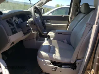 2005 Dodge Durango Limited with VIN 1D8HB58D65F615577, listed as a Copart auction lot 54408425 with 143,011 mi miles and Salvage Title. Bid and sale history available at DreamBid. Image 7.