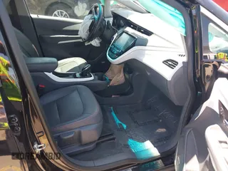 2017 Chevrolet Bolt EV Premier with VIN 1G1FX6S04H4180781, listed as a IAAI auction lot 42228857 with 152,133 mi miles and . Bid and sale history available at DreamBid. Image 5.