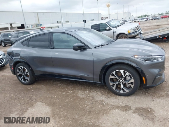 2023 Ford Mustang Mach-E Premium z VIN 3FMTK3SUXPMA84646, wystawiony jako IAAI lot #42202748 z przebiegiem 19 480 mil mil oraz . Historia ofert i sprzedaży dostępna na DreamBid. Obrazek 13.