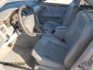 2000 Mercedes-Benz E-Class with VIN WDBJF65J3YB167247, listed as a Copart auction lot 75715464 with 0 mi miles and Salvage Title. Bid and sale history available at carsss.com. Image 7.
