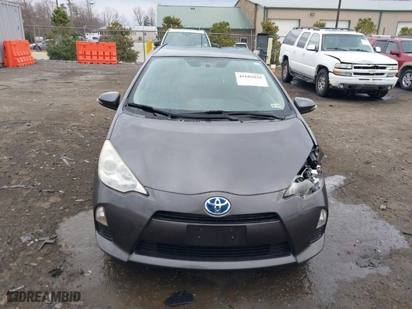 2013 Toyota Prius c One with VIN JTDKDTB31D1531200, listed as a IAAI auction lot 41685835 with 128,996 mi miles. Bid and sale history available at carsss.com. Image 12.