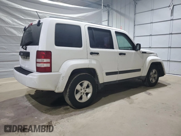 2012 Jeep Liberty Sport with VIN 1C4PJLAK5CW127485, listed as a Copart auction lot 48242425 with 139,273 mi miles and Salvage Title. Bid and sale history available at DreamBid. Image 3.