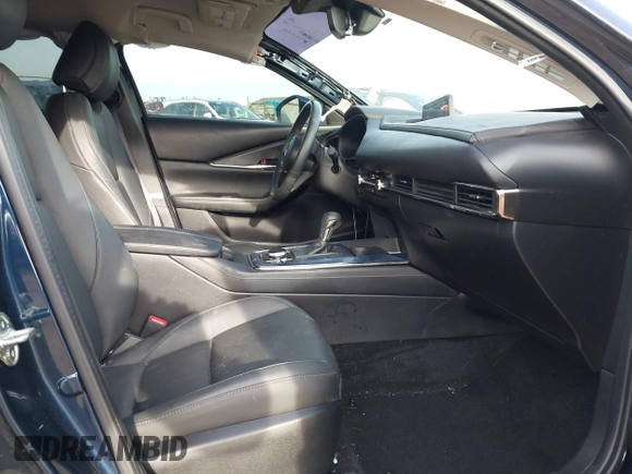 2023 Mazda CX-30 S Carbon Edition с VIN 3MVDMBCM2PM588506, выставлен на аукционе IAAI как лот 41728912 с пробегом 25 030 миль миль и . История ставок и продаж доступна на DreamBid. Изображение 5.