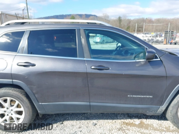 2018 Jeep Cherokee Latitude Plus with VIN 1C4PJLLXXJD606504, listed as a IAAI auction lot 41731085 with 95,569 mi miles. Bid and sale history available at carsss.com. Image 13.