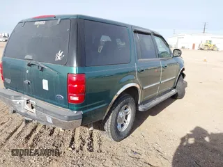 2000 Ford Expedition XLT with VIN 1FMPU16L9YLA38925, listed as a IAAI auction lot 41070582 with Not Provided miles and . Bid and sale history available at DreamBid. Image 4.