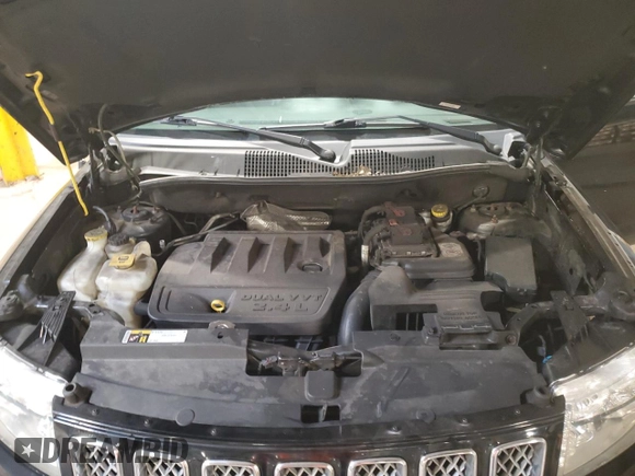 2017 Jeep Compass Latitude with VIN 1C4NJDEB6HD168072, listed as a Copart auction lot 63045025 with 82,975 mi miles and Salvage title. Bid and sale history available at DreamBid. Image 12.