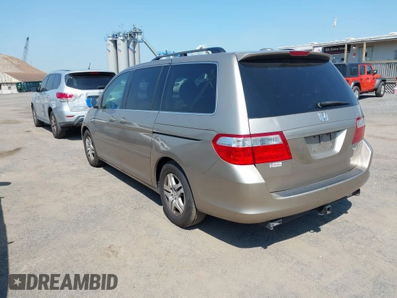 2005 Honda Odyssey EX-L with VIN 5FNRL38755B107829, listed as a IAAI auction lot 42422225 with 227,008 mi miles and . Bid and sale history available at DreamBid. Image 3.