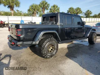 2020 Jeep Gladiator Rubicon z VIN 1C6JJTBG5LL101185, wystawiony jako Copart lot #83012014 z przebiegiem Nie podano mil oraz Nie do naprawy • Non repairable. Historia ofert i sprzedaży dostępna na DreamBid. Obrazek 3.