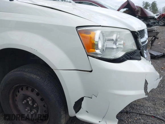 2012 Dodge Grand Caravan SE with VIN 2C4RDGBG9CR232038, listed as a IAAI auction lot 41823766 with 77,468 mi miles and . Bid and sale history available at DreamBid. Image 14.