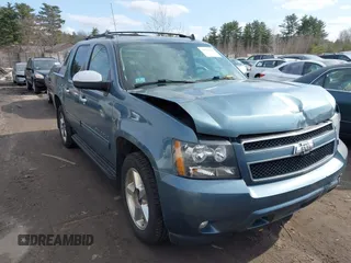 2011 Chevrolet Avalanche LT with VIN 3GNTKFE3XBG102649, listed as a IAAI auction lot 41718557 with 242,561 mi miles. Bid and sale history available at carsss.com. Image 1.