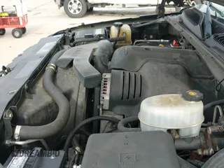 2004 Cadillac Escalade z VIN 1GYEK63N14R219216, wystawiony jako IAAI lot #42781662 z przebiegiem 208 145 mil mil oraz . Historia ofert i sprzedaży dostępna na DreamBid. Obrazek 12.