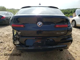2021 BMW X4 xDrive30i with VIN 5UX2V1C04M9E92675, listed as a Copart auction lot 52495333 with 54,111 mi miles. Bid and sale history available at carsss.com. Image 6.