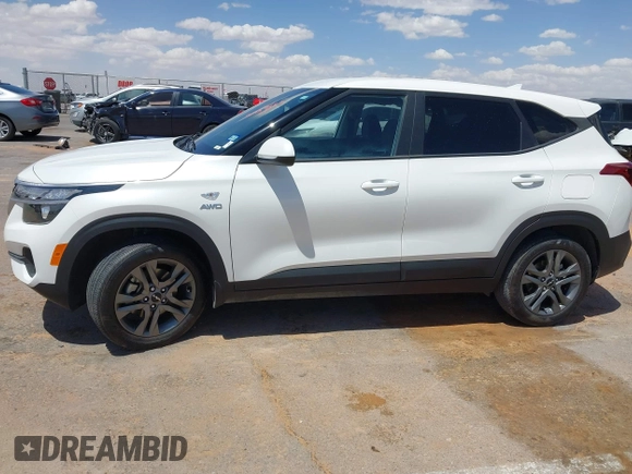 2023 Kia Seltos LX with VIN KNDEPCAA7P7367893, listed as a IAAI auction lot 42184883 with 21,993 mi miles and . Bid and sale history available at DreamBid. Image 14.