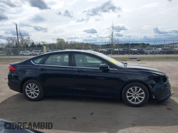2017 Ford Fusion S with VIN 3FA6P0G77HR212596, listed as a IAAI auction lot 41910716 with 94,502 mi miles. Bid and sale history available at carsss.com. Image 13.