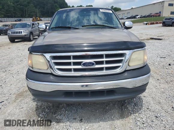 2001 Ford F-150 XLT z VIN 1FTRW07L81KF68346, wystawiony jako Copart lot #57460445 z przebiegiem Nie podano mil oraz Szkoda całkowita • Salvage title. Historia ofert i sprzedaży dostępna na DreamBid. Obrazek 5.
