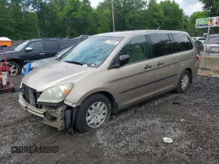2007 Honda Odyssey LX z VIN 5FNRL382X7B044914, wystawiony jako Copart lot #57236665 z przebiegiem 294 050 mil mil oraz Szkoda całkowita • Salvage title. Historia ofert i sprzedaży dostępna na DreamBid. Obrazek 1.