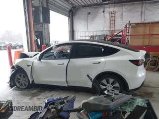 2023 Tesla Model Y Long Range z VIN 7SAYGAEEXPF789037, wystawiony jako IAAI lot #41551605 z przebiegiem 8 630 mil mil oraz . Historia ofert i sprzedaży dostępna na DreamBid. Obrazek 14.