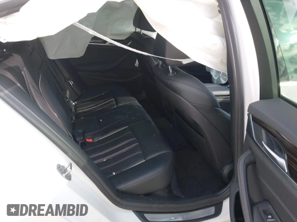 2018 BMW 5 Series 530i with VIN WBAJA5C5XJWA56855, listed as a IAAI auction lot 41128814 with Not Provided miles and . Bid and sale history available at DreamBid. Image 8.