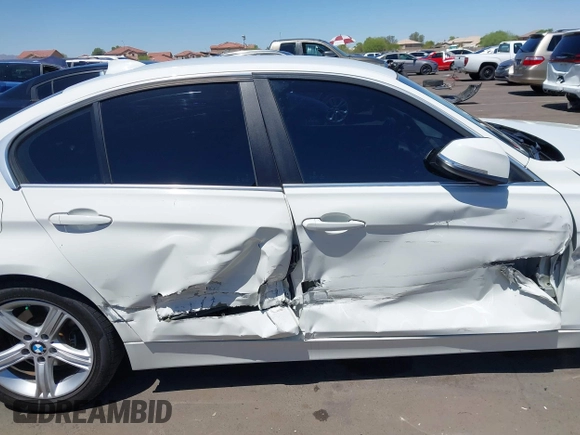2015 BMW 3 Series 328i with VIN WBA3C1C52FK117753, listed as a IAAI auction lot 42270013 with 147,386 mi miles and . Bid and sale history available at DreamBid. Image 13.