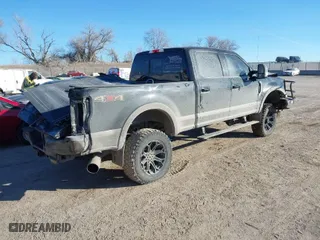 2017 Ford Super Duty F-250 SRW Lariat with VIN 1FT7W2BT8HED31729, listed as a IAAI auction lot 41396178 with 128,564 mi miles. Bid and sale history available at carsss.com. Image 4.