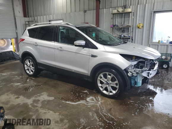 2014 Ford Escape Titanium с VIN 1FMCU0J98EUA35069, выставлен на аукционе Copart как лот 58369635 с пробегом 92 323 миль миль и Списание • Salvage title. История ставок и продаж доступна на DreamBid. Изображение 4.