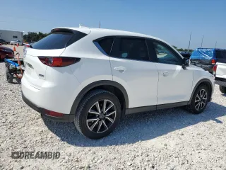 2018 Mazda CX-5 Touring with VIN JM3KFACM6J1301189, listed as a Copart auction lot 58255024 with 85,052 mi miles and Clean Title. Bid and sale history available at carsss.com. Image 3.