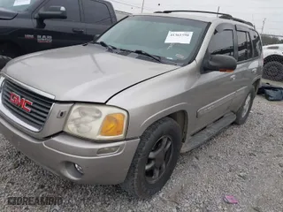 2002 GMC Envoy SLT with VIN 1GKDT13S222241632, listed as a IAAI auction lot 41361598 with 275,343 mi miles. Bid and sale history available at carsss.com. Image 2.