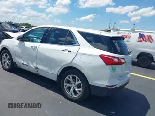 2020 Chevrolet Equinox LT z VIN 3GNAXKEV0LS650936, wystawiony jako IAAI lot #42263480 z przebiegiem 51 723 mil mil oraz . Historia ofert i sprzedaży dostępna na DreamBid. Obrazek 3.