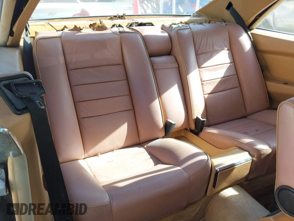 1986 Mercedes-Benz 560 z VIN WDBCA45D7GA200289, wystawiony jako IAAI lot #42313986 z przebiegiem 203 457 mil mil oraz . Historia ofert i sprzedaży dostępna na DreamBid. Obrazek 8.